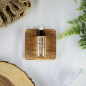 Natural serum bottle with plants, photo by Tiffany Oakley on Unsplash
